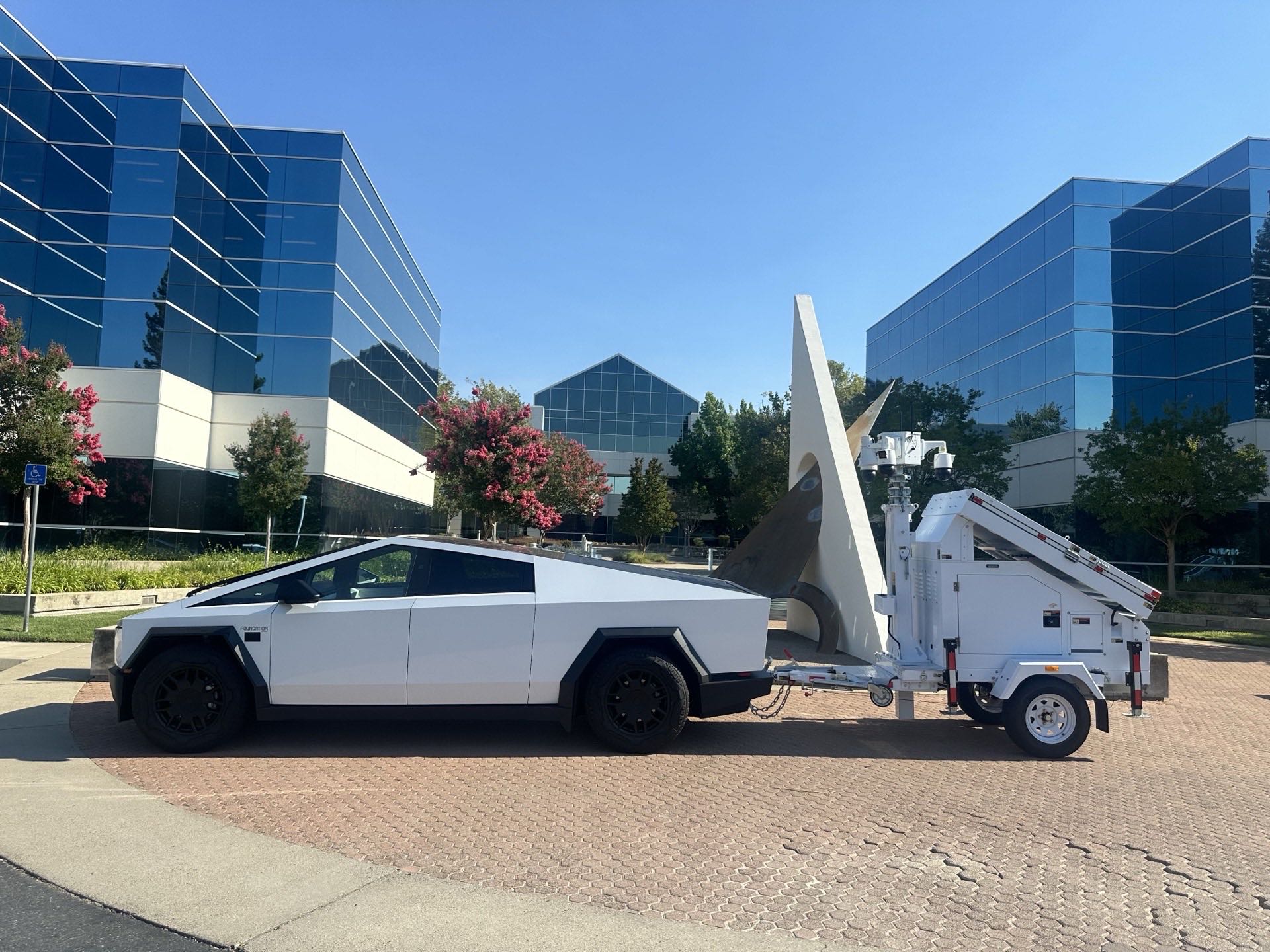 PSP Cybertruck with AI camera tower at a corporate campus