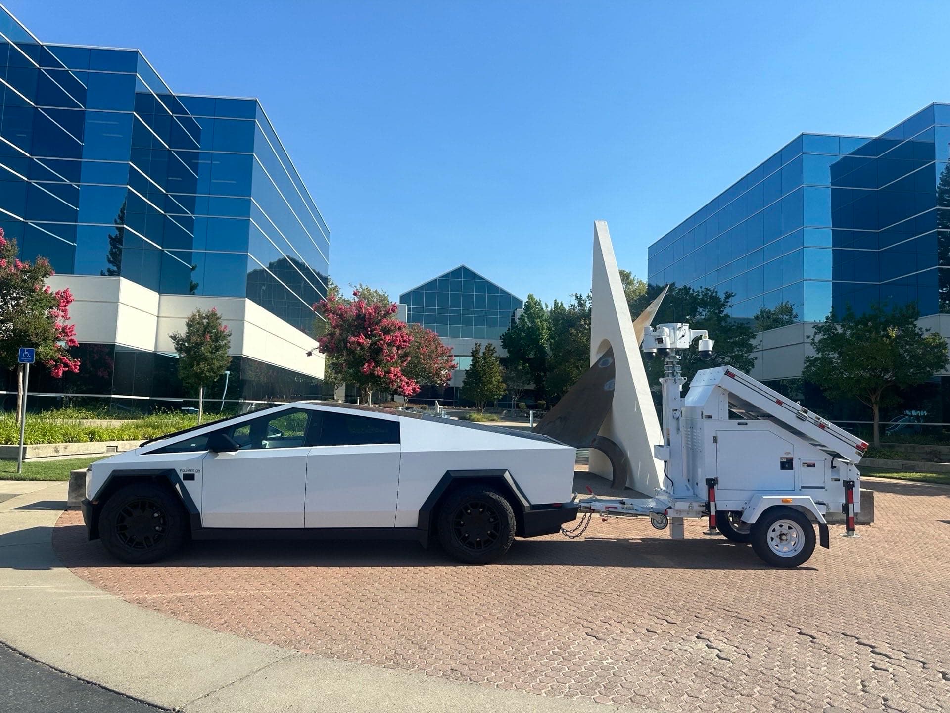 PSP Cybertruck with AI camera tower at a corporate campus